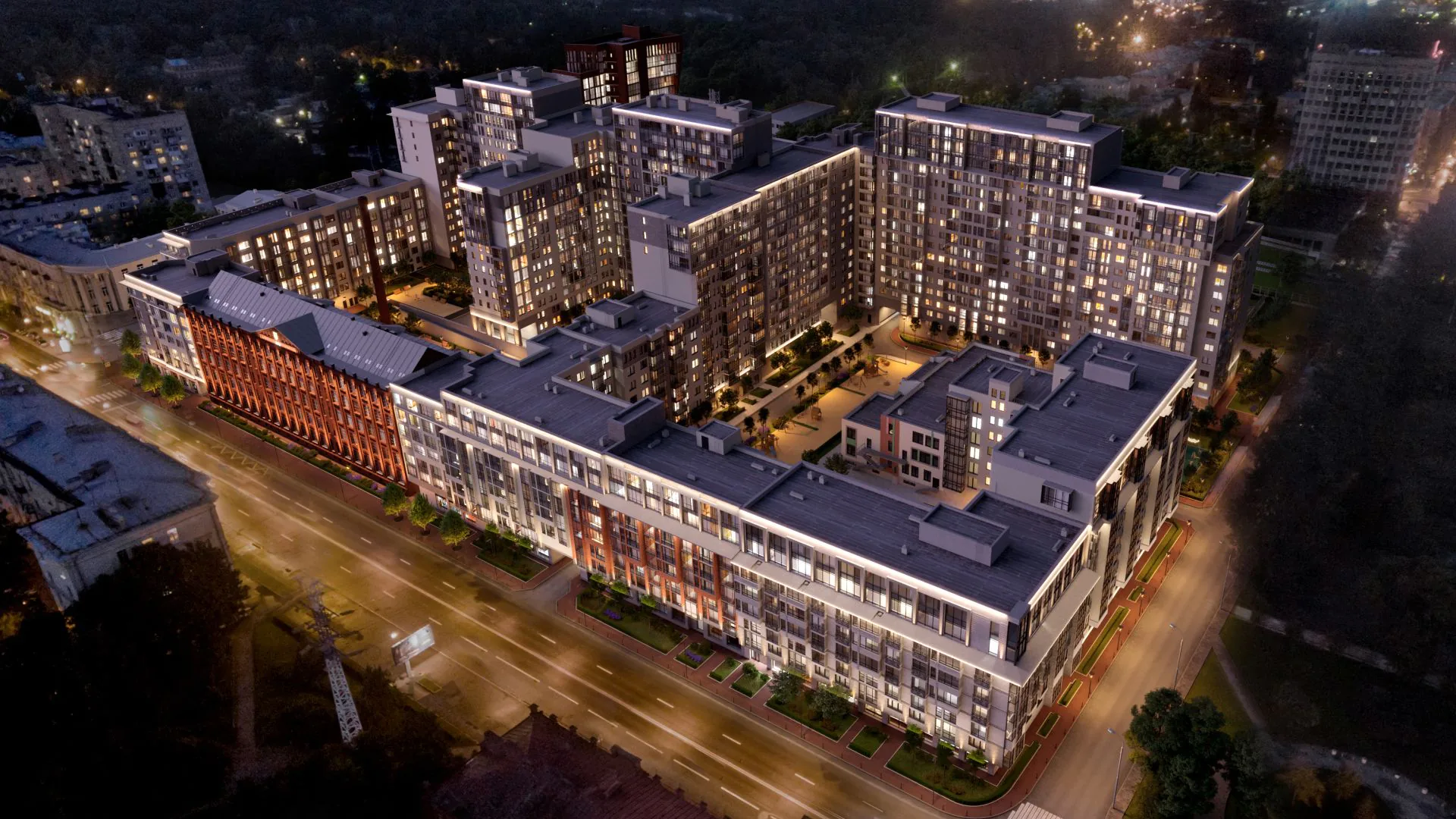 Luxury mid-rise residential building at sunset, featuring modern architecture and illuminated facade, developed by TIN INTERNATIONAL LTD for high-end urban living.